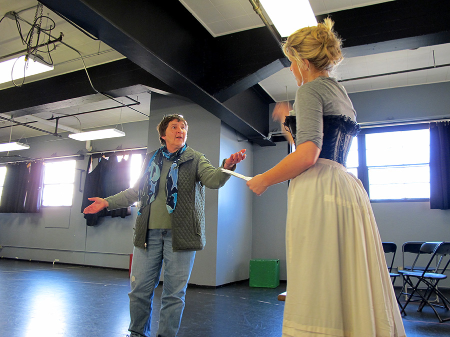 Mary Machala directs Emily Grogan (Anna) during a rehearsal; photo by Shannon Erickson.