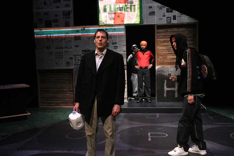 Matt Prior (Evan Whitfield) and the cast of The Financial Lives of the Poets; photo by Alan Alabastro.